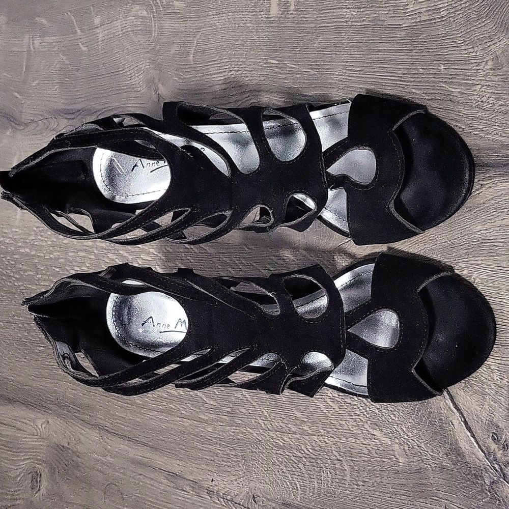 Black strappy heels. Anne Mitchell Rapture